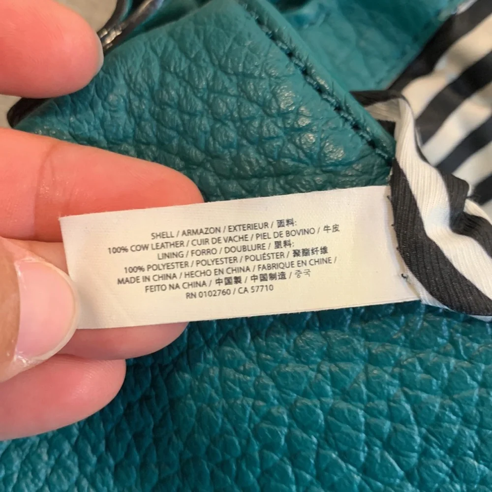 Kate Spade green leather hand bag